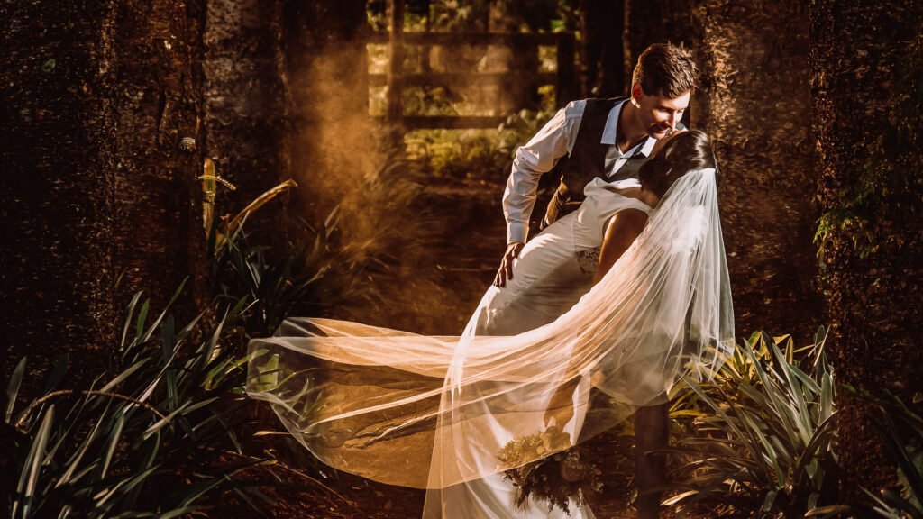 Simulate golden hour haze with off-camera flash for a whimsical forest portrait